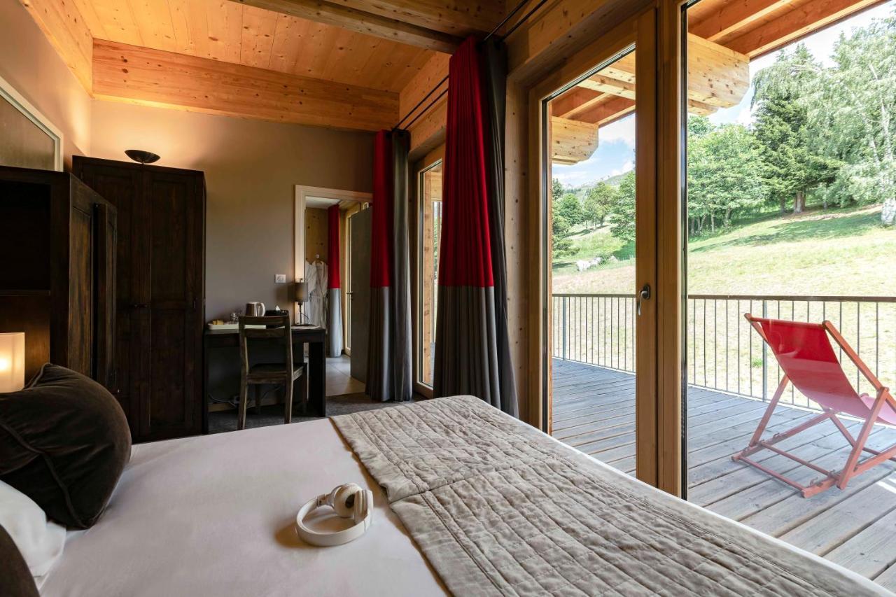 L'Aiguille Grive Chalets Hotel Les Arcs  المظهر الخارجي الصورة